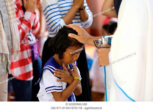 Assumption celebration in Battambang catholic church