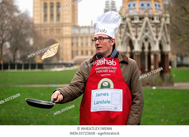 The 21st annual Rehab Parliamentary Pancake Race, supported by Lyle’s Golden Syrup, between a team of MPs and media in Victoria Tower Gardens, Millbank