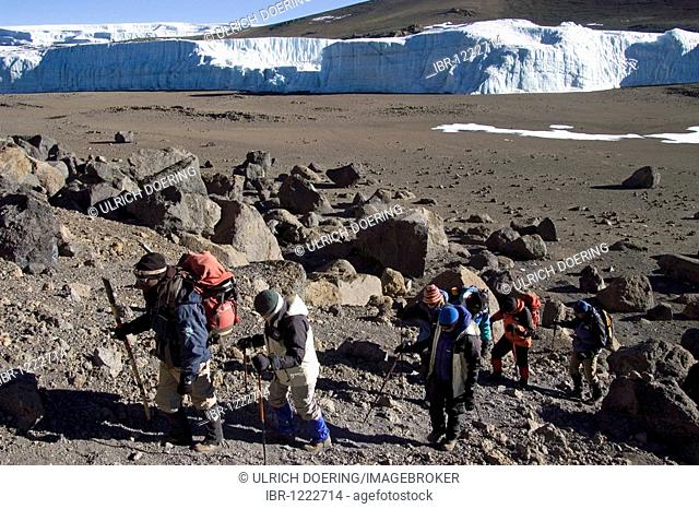 Mountaineer and local guide at the ascent to the summit of the Kilimanjaro via the Western Breach route, Tanzania, Africa