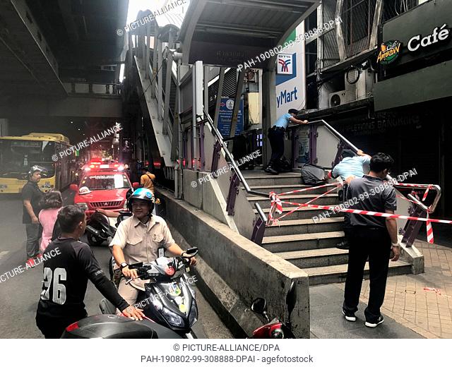 02 August 2019, Thailand, Bangkok: Thai police block the busy Skytrain station Salah Daeng after explosions of several explosive devices in the capital Bangkok