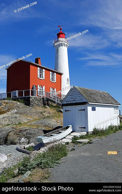 A close up of FIsgard Lighthouse under a clear sky in Victoria BC, Canada