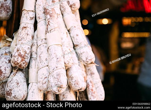 Hanging Cured Sausage Salame Corallina In Local Market. Italian Cuisine