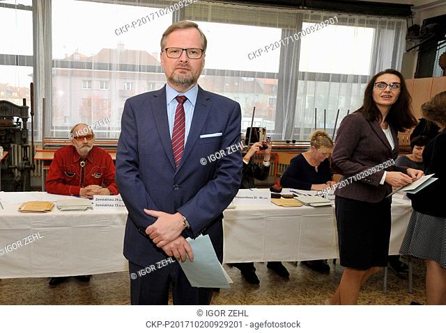 Petr Fiala (left), Chairman of the Czech political party ODS (Civic Democratic Party), voted with his wife Jana Fialova (right) during elections to the Chamber...