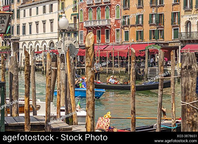 VENICE, ITALY: Canal grande landscape with boats and gondolas in Venice