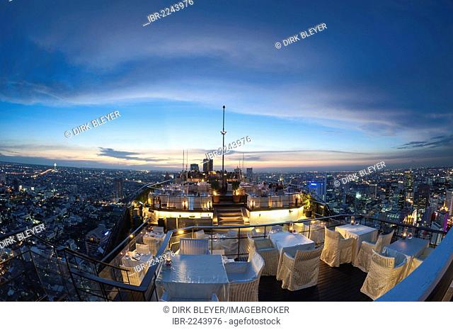 View of the city, Vertigo Bar and Restaurant, roof of the Banyan Tree Hotel, at dusk Bangkok, Thailand, Asia