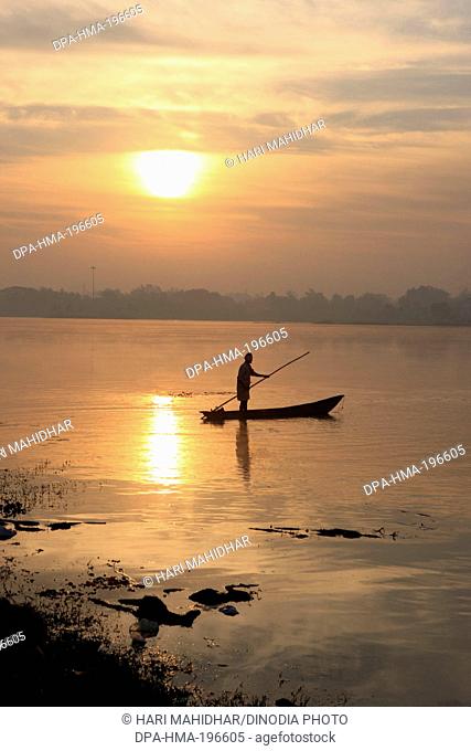 Fishing boat in dalpat sagar lake, jagdalpur, bastar, chhattisgarh, india, asia