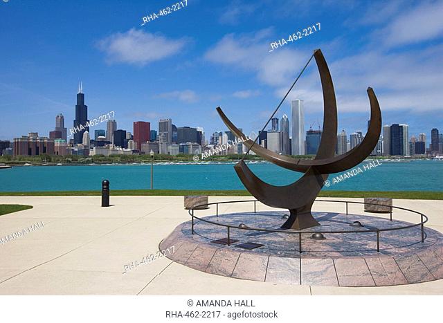Sundial sculpture at the Adler Planetarium and city skyline, Chicago, Illinois, United States of America, North America