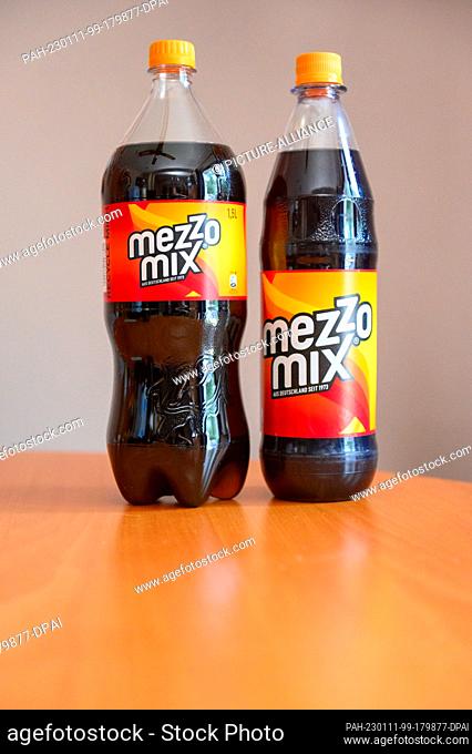 PRODUCTION - 24 September 2022, Hamburg: Two bottles of Mezzo Mix stand on a table. Photo: Jonas Walzberg/dpa. - Hamburg/Hamburg/Germany