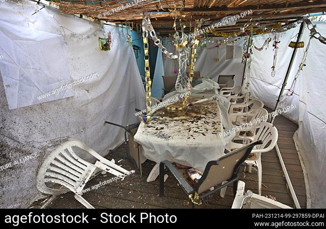 14 December 2023, Israel, Magen: Remains of a children's birthday party on a terrace in the kibbutz Nir Oz. In the south of Israel