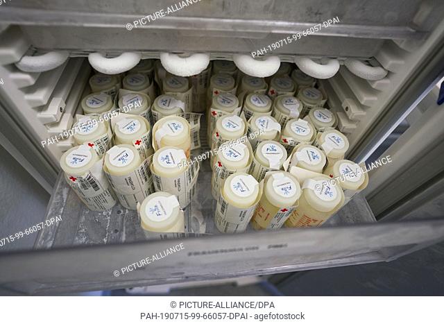 15 July 2019, Hessen, Frankfurt/Main: Frozen breast milk is stored in a refrigerator in the newly equipped women's milk bank