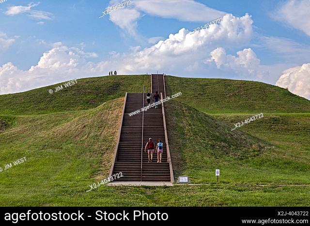 Collinsville, Illinois - Visitors climb 156 steps to the top of Monks Mound at Chokia Mounds State Historic Site. Covering 14 acres and 100 feet high