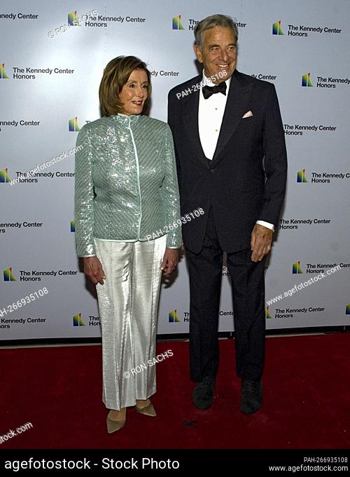 Speaker of the United States House of Representatives Nancy Pelosi (Democrat of California), left, and her husband, Paul Pelosi
