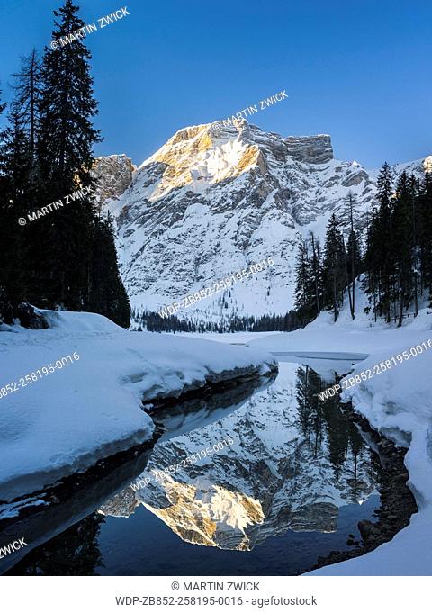 Lake Prager Wildsee (Lago di Braies) in the nature park Fanes Sennes Prags, part of UNESCO World Heritage Dolomites, during winter in deep snow