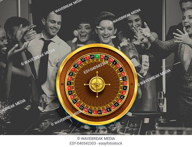 Roulette wheel and people playing in casino