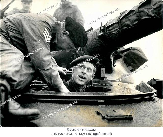 Mar. 03, 1969 - Prince Philip Drives Chieftain Tank: Prince Philip pictured yesterday in a 51-ton Chieftain tank which he drove for the first time during his...