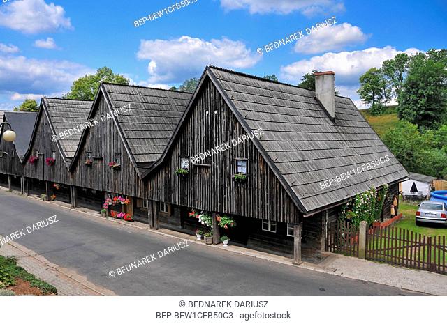 Houses called Twelve Apostles - a set of wooden weavers' houses, from 1707 in Chelmno Slaskie, Lower Silesian Voivodeship, Poland