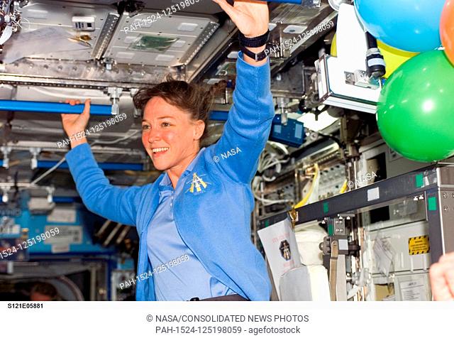 FILE: In this photo released by NASA, Astronaut Lisa M. Nowak, STS-121 mission specialist, smiles at a crew mate in the Destiny laboratory of the International...