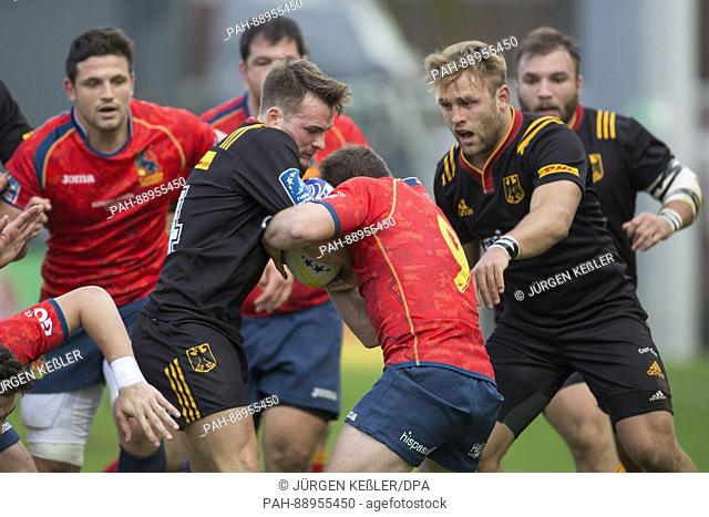 Bastian Himmer (Germany, 14) and Guillaume Rouet (Spain, 9) in action during the European Rugby Championship Division 1A match between Germany and Spain in...