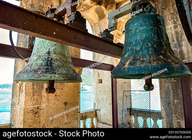 Old bells in a tower in the city of Perast Montenegro