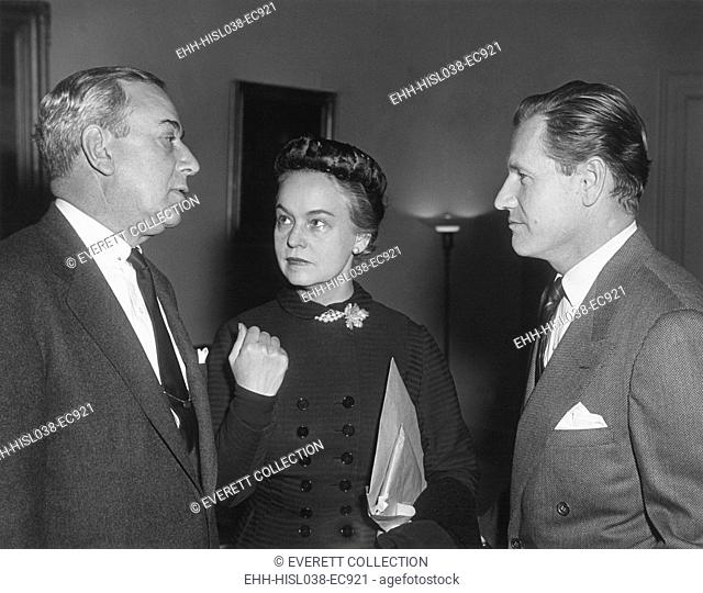 Oveta Culp Hobby flanked by Senator William Purtel and Undersecretary of HEW, Nelson Rockefeller. Dec. 11, 1953. Hobby was second female Cabinet officer and the...