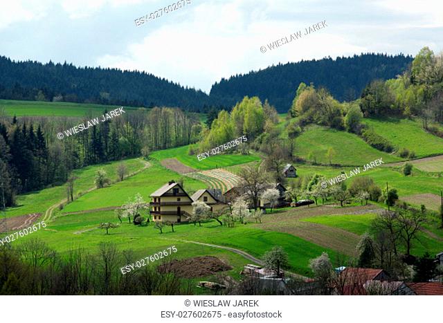 Idyllic rural view of gently rolling patchwork farmland