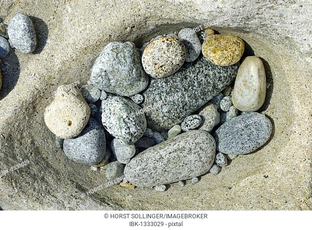 Polished granite stones in an eroded tidal basin, Tyrrhenian Sea, Mediterranean Sea, Italy, Europe