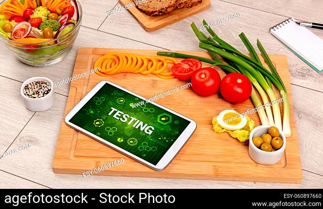 Healthy Tablet Pc compostion with TESTING inscription, immune system boost concept