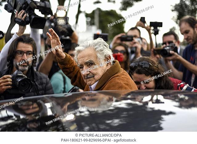 21 June 2018, Brazil, Curitiba: Jose Mujica (C), ex-president of Uruguay, leaving the prison where former Brazilian head of state Lula da Silva is currently...