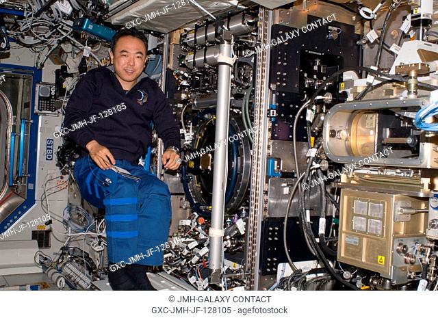 Japan Aerospace Exploration Agency astronaut Satoshi Furukawa, Expedition 28 flight engineer, is pictured near the Combustion Integrated Rack (CIR) Multi-user...
