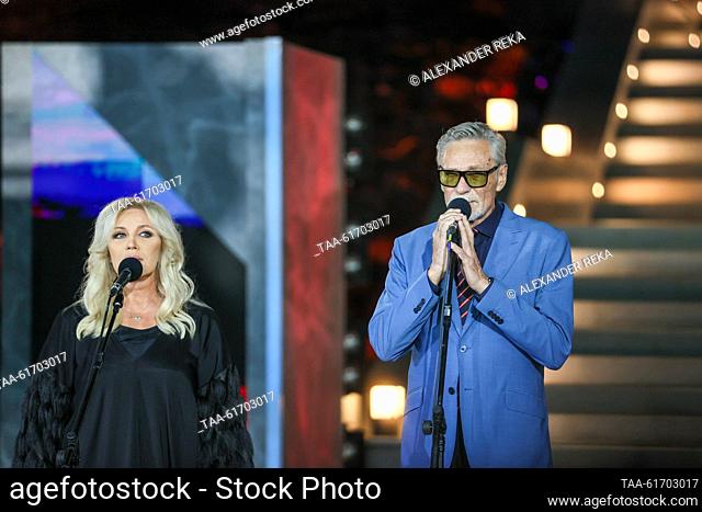 RUSSIA, LUGANSK - SEPTEMBER 2, 2023: Singer Taisiya Povaliy (L) and actor Alexander Mikhailov speak during a ceremony marking the re-opening of renovated...