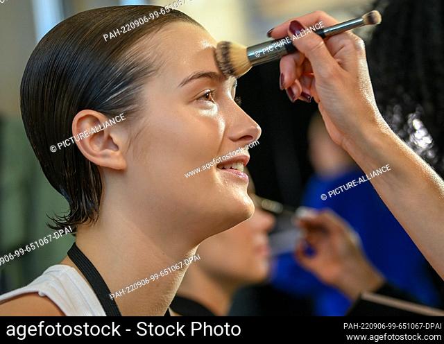 06 September 2022, Berlin: Models are made up backstage before the show of Kilian Kerner at the Mercedes-Benz Fashion Week at the Telegraphenamt on the occasion...