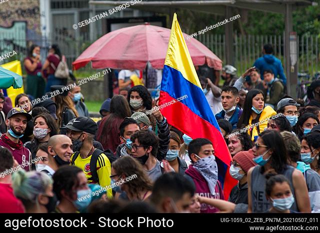 A demonstrator holds a sign against the tax reform and former president of Colombia Alvaro Uribe Velez in Bogota, Colombia on May 7 2021 after peaceful...