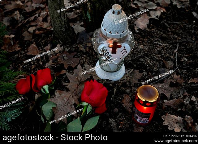 An improvised place of worship at the crime scene of the double murder at Klanovice Forest, Prague, Czech Republic, pictured on December 18, 2023
