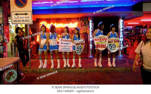 THAILAND  Pattaya  Beach resort famous for night life and sex tourism  Walking street  Touts advertising cheap drinks outside girlie bars