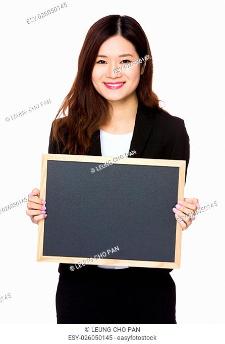 Asian Businesswoman showing with the chalkboard