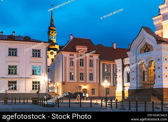 Tallinn, Estonia. Cathedral Of Saint Mary The Virgin or Dome Church And Entrance To Alexander Nevsky Cathedral In Night Time