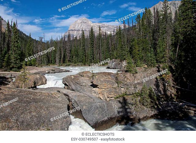 Natural bridge that once was a waterfall over the Kicking Horse River in Yoho National Park, British Columbia, Canada