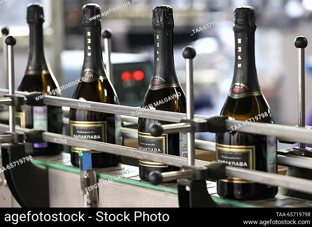 RUSSIA, SEVASTOPOL - DECEMBER 13, 2023: A sparkling wine bottling line at the Shampaneria winery run by the Zolotaya Balka company