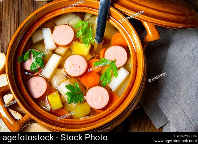 Potato kohlrabi soup with bockwurst