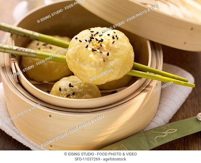 Chinese stuffed yeast dumplings in bamboo steamer