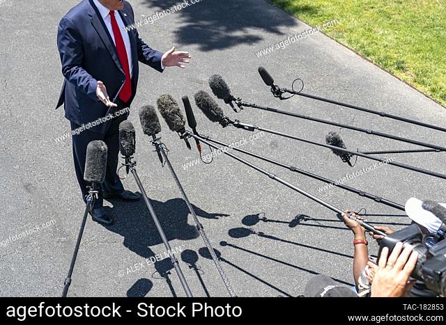 U.S. President Donald Trump speaks with reporters on the South Lawn prior to departing the White House aboard Marine One on June 26, 2019 in Washington, D