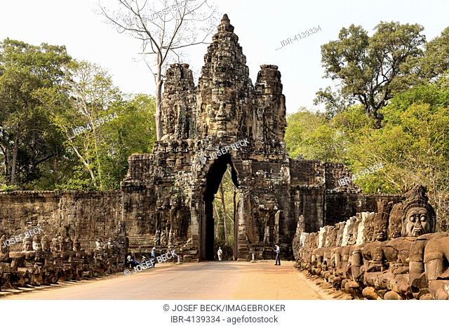 South Gate of Angkor Thom, Avalokiteshvara face tower, Asura statues, Gopuram, demons balustrade on the bridge, Angkor Thom, Siem Reap, Cambodia