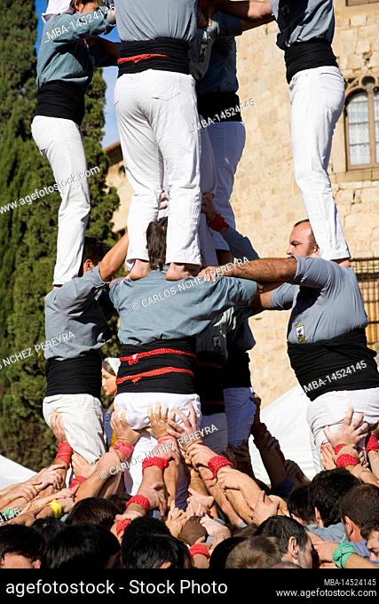 Castellers performing in Plaza Octavia in Sant Cugat del Valles in the province of Barcelona in Catalonia Spain
