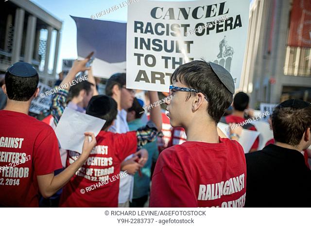 Boys from Yeshiva Rambam Mesivta join hundreds of Jews and supporters to protest in front of the Metropolitan Opera at Lincoln Center on opening night, Monday