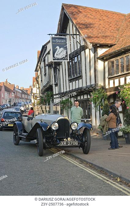 Classic vintage Bentley parking in the front of Swan Hotel in Lavenham, Suffolk, UK
