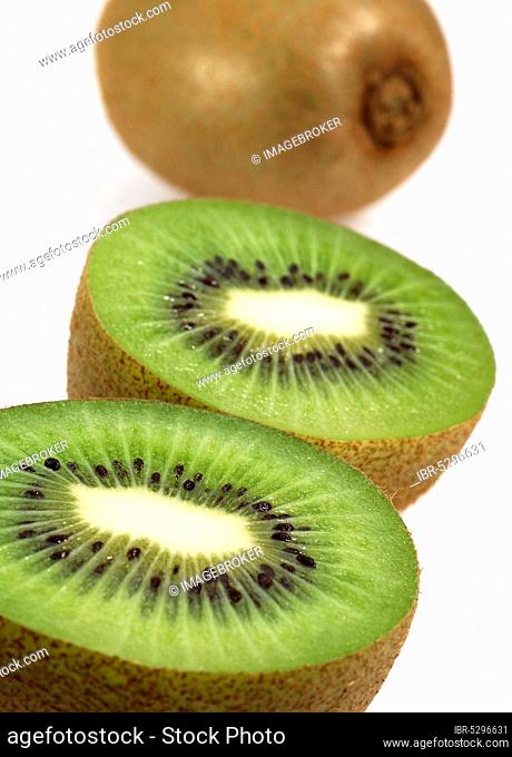 Kiwi (actinidia chinensis), Fruits against White Background