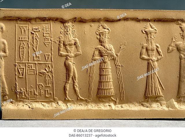 Akkadian civilization, 2330-2150 b.C. Clay impression of a cylinder seal depicting adoration scene. From Nippur, Iraq. Detail