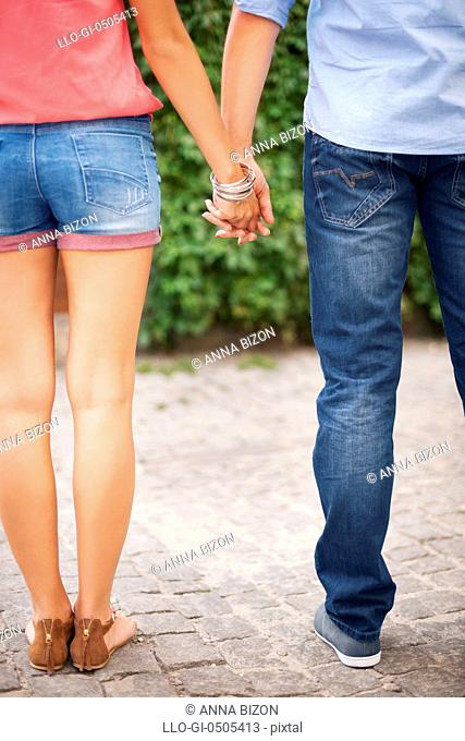 Part of couple with holding hands, Debica, Poland