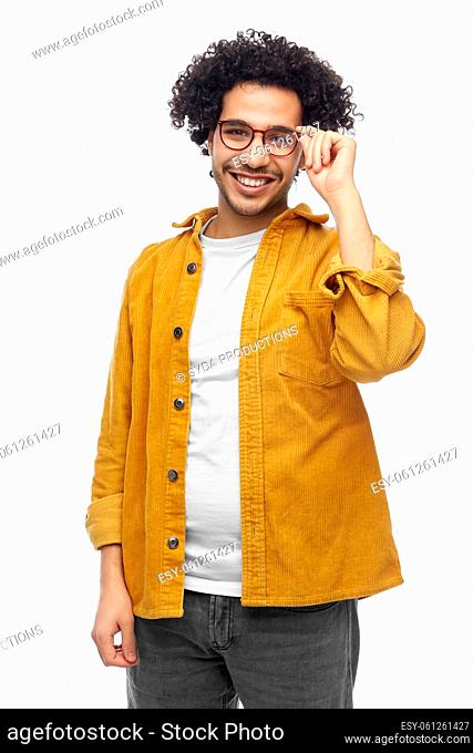 happy smiling man in glasses and yellow jacket