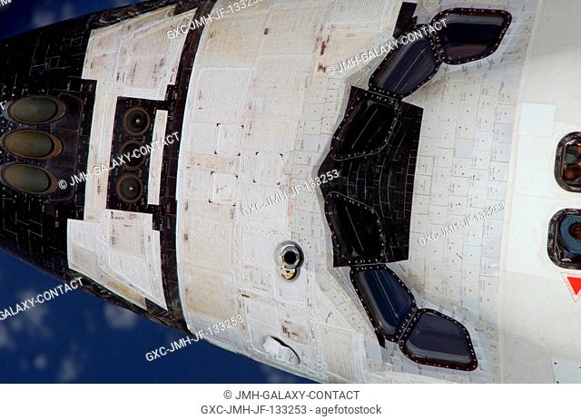 The topside of Discovery's crew cabin is visible in this high angle scene photographed by one of the Expedition 13 crewmembers onboard the International Space...